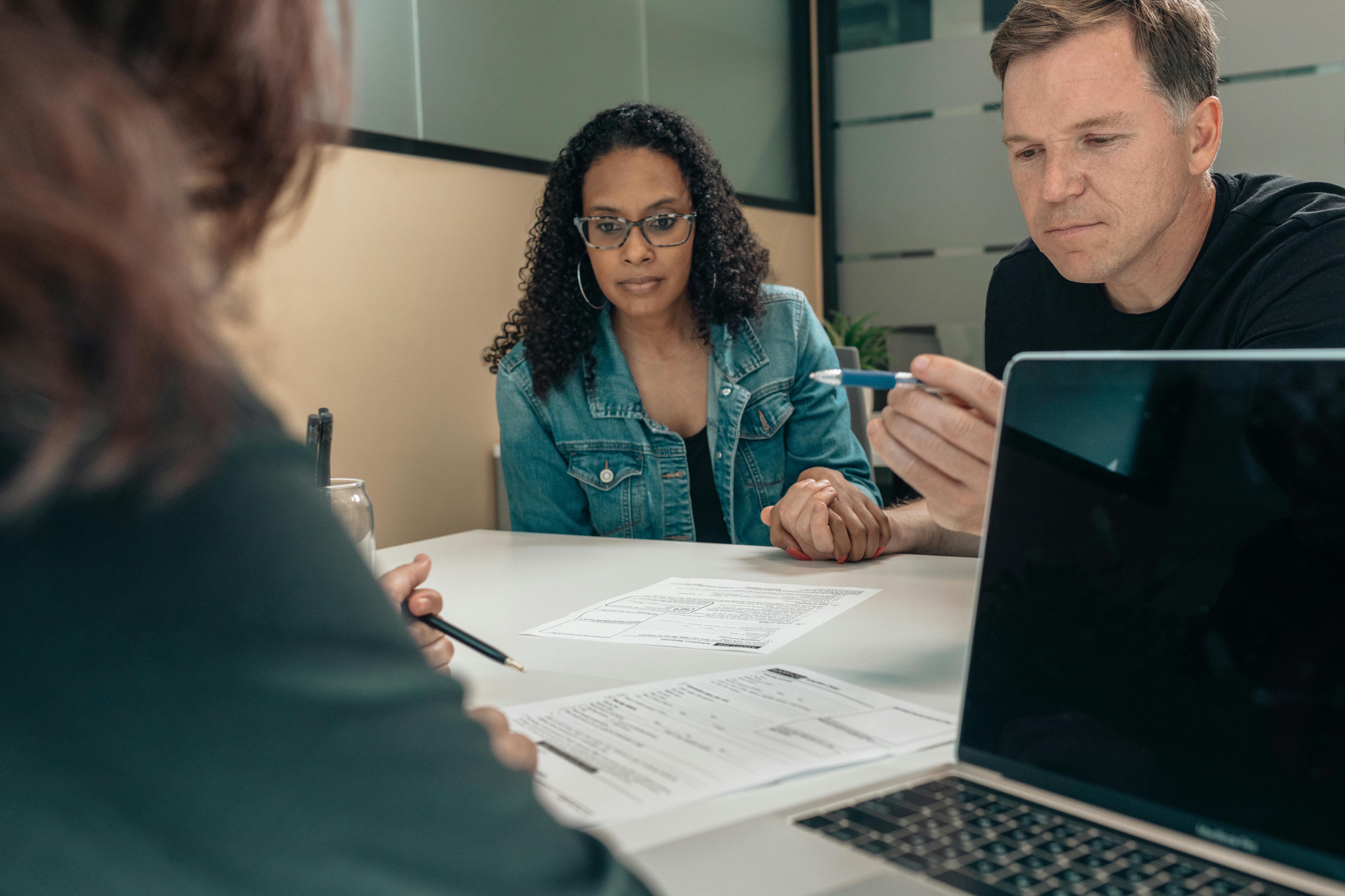 Financial services team reviewing a process improvement workflow