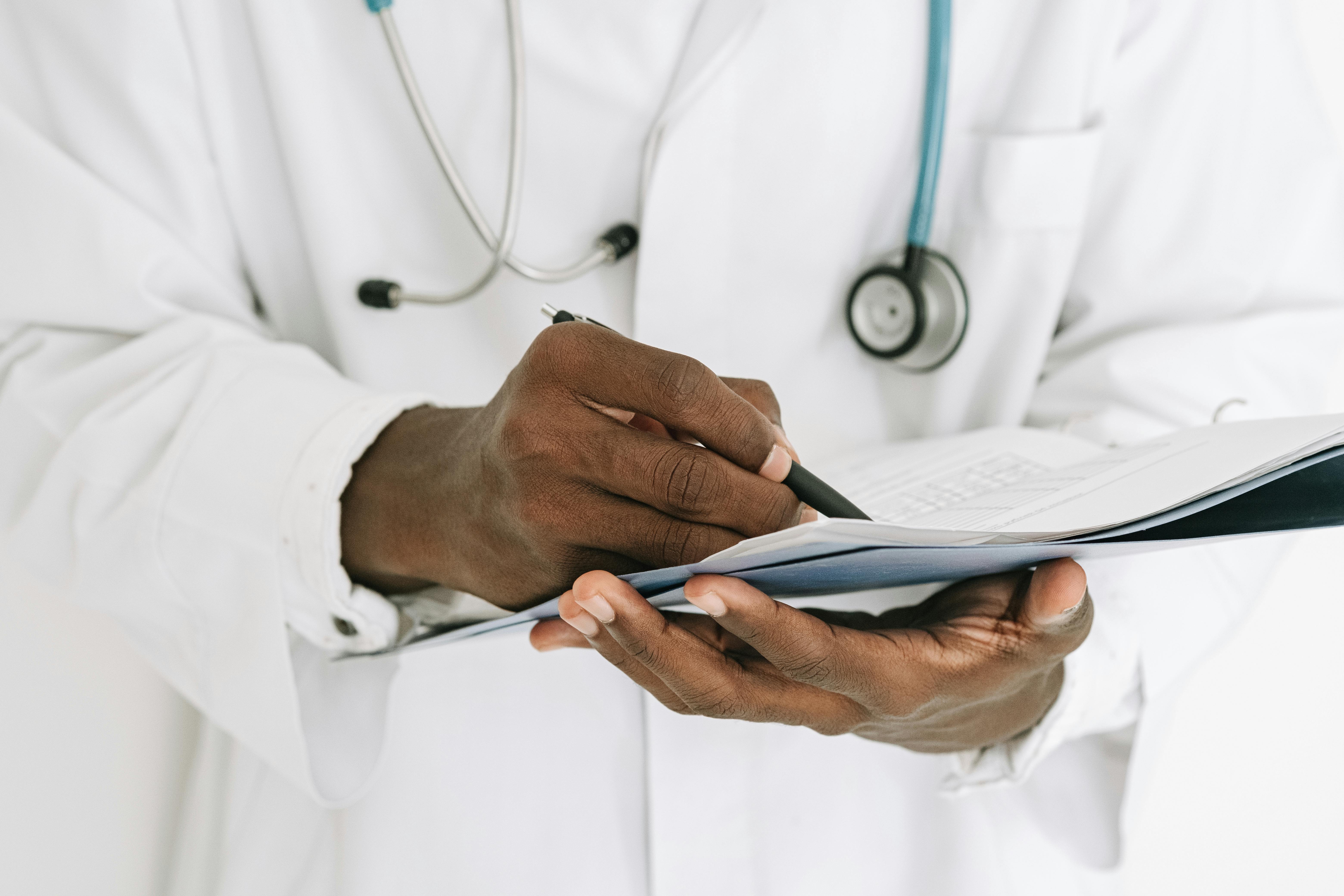 Healthcare professional reviewing an onboarding or operational process